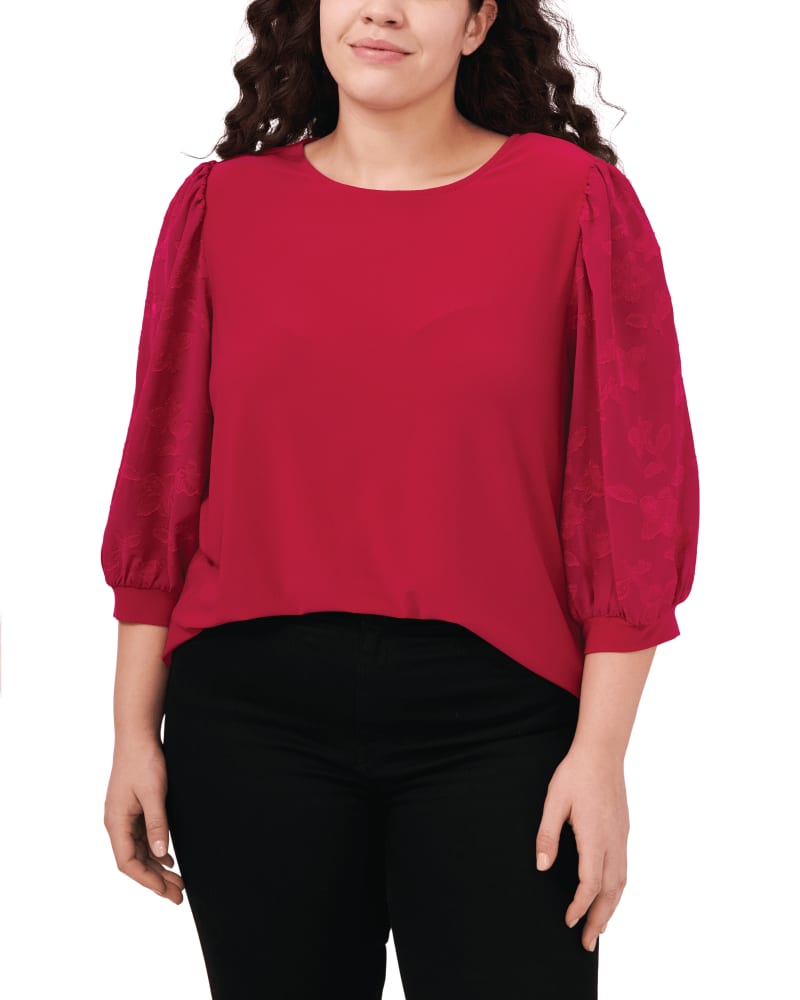 Front of a model wearing a size 1X Margaret Lace Sleeve Top in PLUMERIA by CeCe. | dia_product_style_image_id:263854